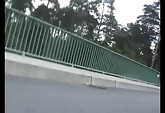 On a bridge over a street