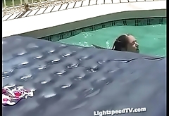 Tawnee Stone having fun in the pool