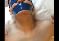Chinese slave boy Tied up and tightly tape gagged with blue PVC tape
